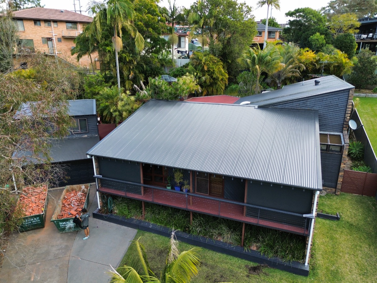 tile to metal roof replacement by Spark Roofing & Guttering in Jewells, NSW